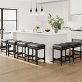 MALOL Set of 4 Saddle Bar Stools Counter Height 24.4”, Backless Barstools for Kitchen Island, Modern PU Leather Cushioned Seat, Bar Chairs for Kitchen Counter, Breakfast Bar Stools for Home,Black