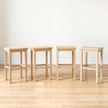 Grain & Grove Smith Collection Set of 4 Solid Wood Bar Stools, 30 inch Saddle-Seat Bar Chairs, Backless, Heavy-Duty Construction, Footrest Support, for Kitchen Islands, Home Bars, and Counters, Blonde